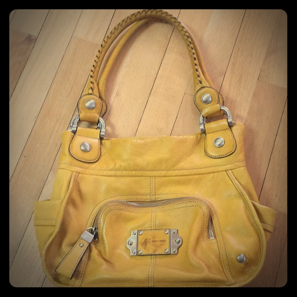 B. Makowsky leather yellow purse